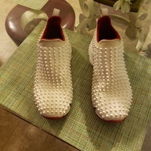 Christian Louboutin tennis shoes used size 9